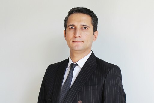 Tural Ahmadov, experienced lawyer in commercial, civil, banking, international law. Worked in real estate registry, banking, financial market control. Member of Azerbaijan Bar Association, actively involved in court dispute investigations. Holds degrees from Baku State University. Fluent in Azerbaijani, English, Turkish.